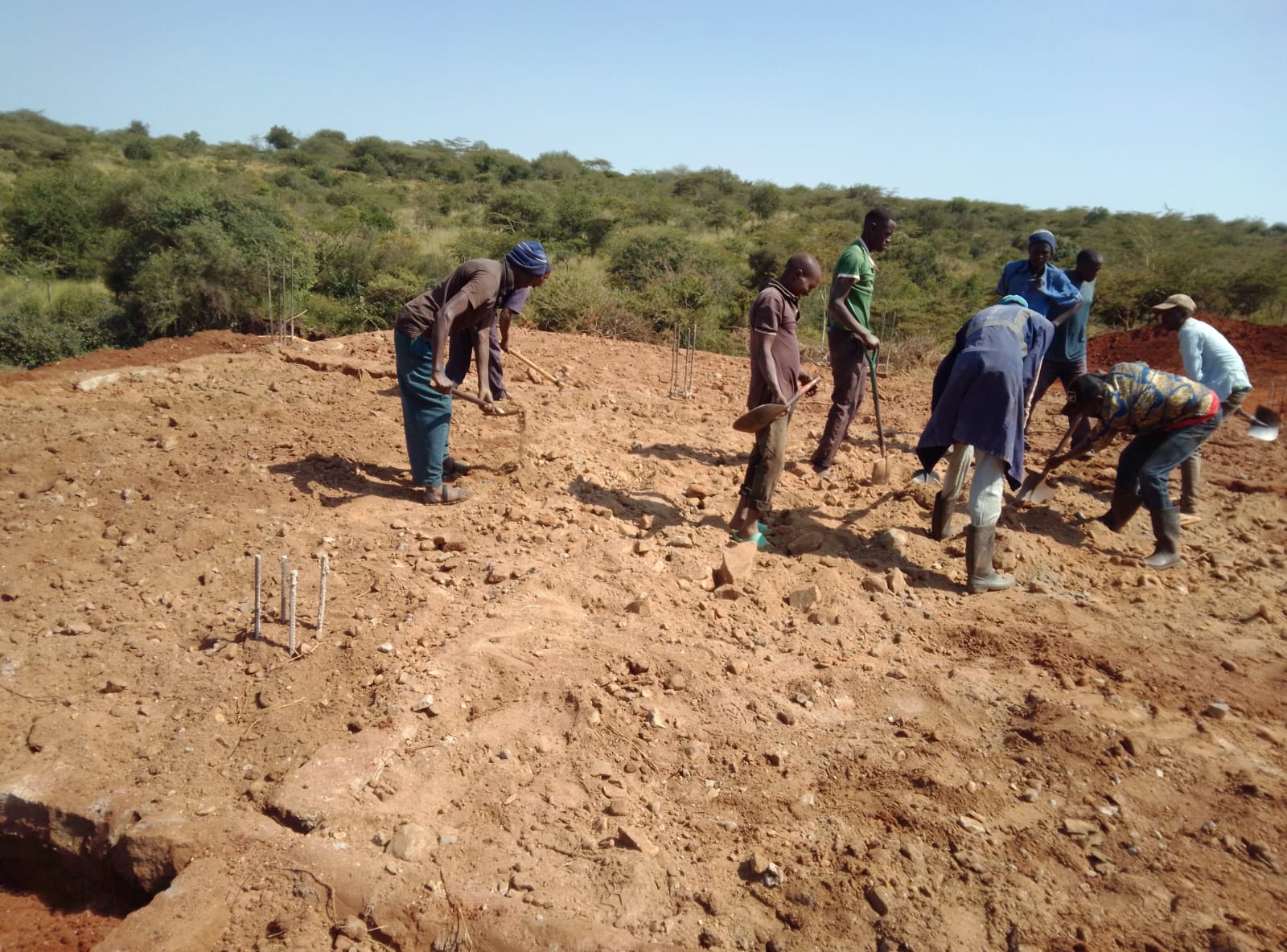 Foundation trenching by hand