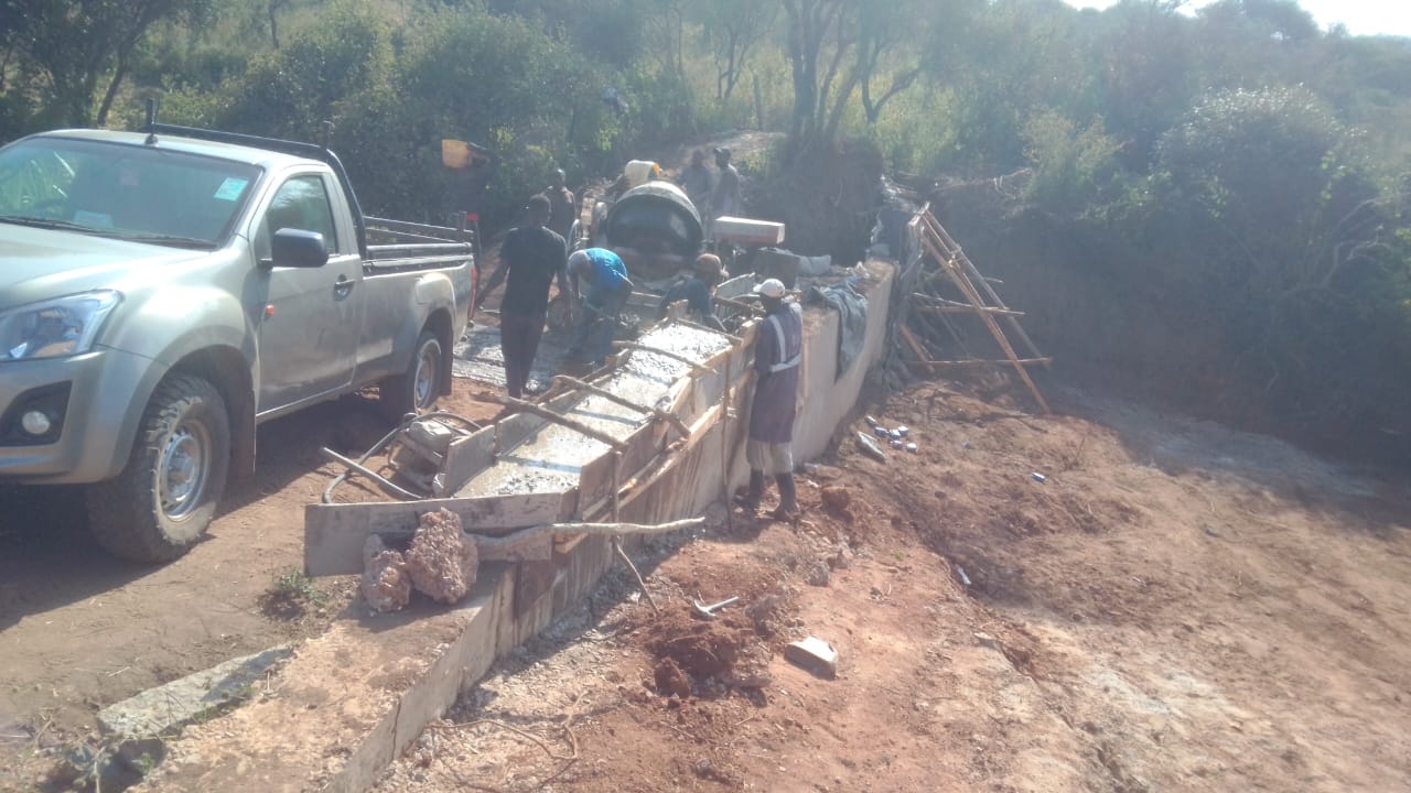Stone Retaining Wall - Sloped Site